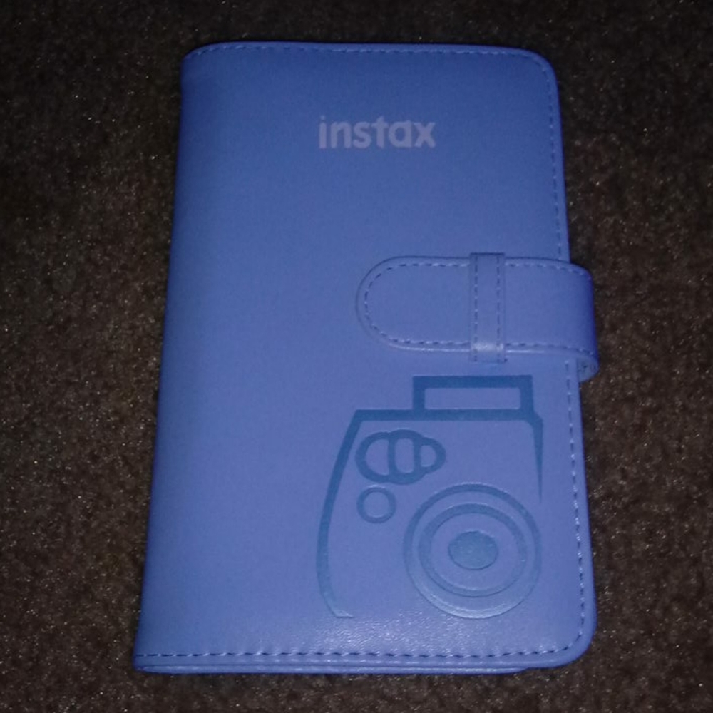 An instax film to hold your polaroid pictures.